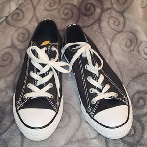 Black and white low top Converse.